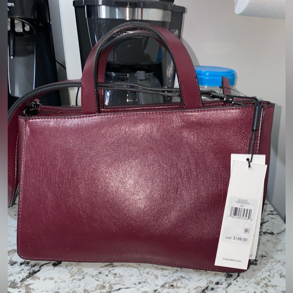 BRAND NEW, never used. Calvin Klein beautiful womens bag. Maroon color. - Picture 2 of 4